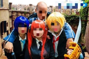 The suspect (top) poses with three other girls during a cosplay photoshoot .